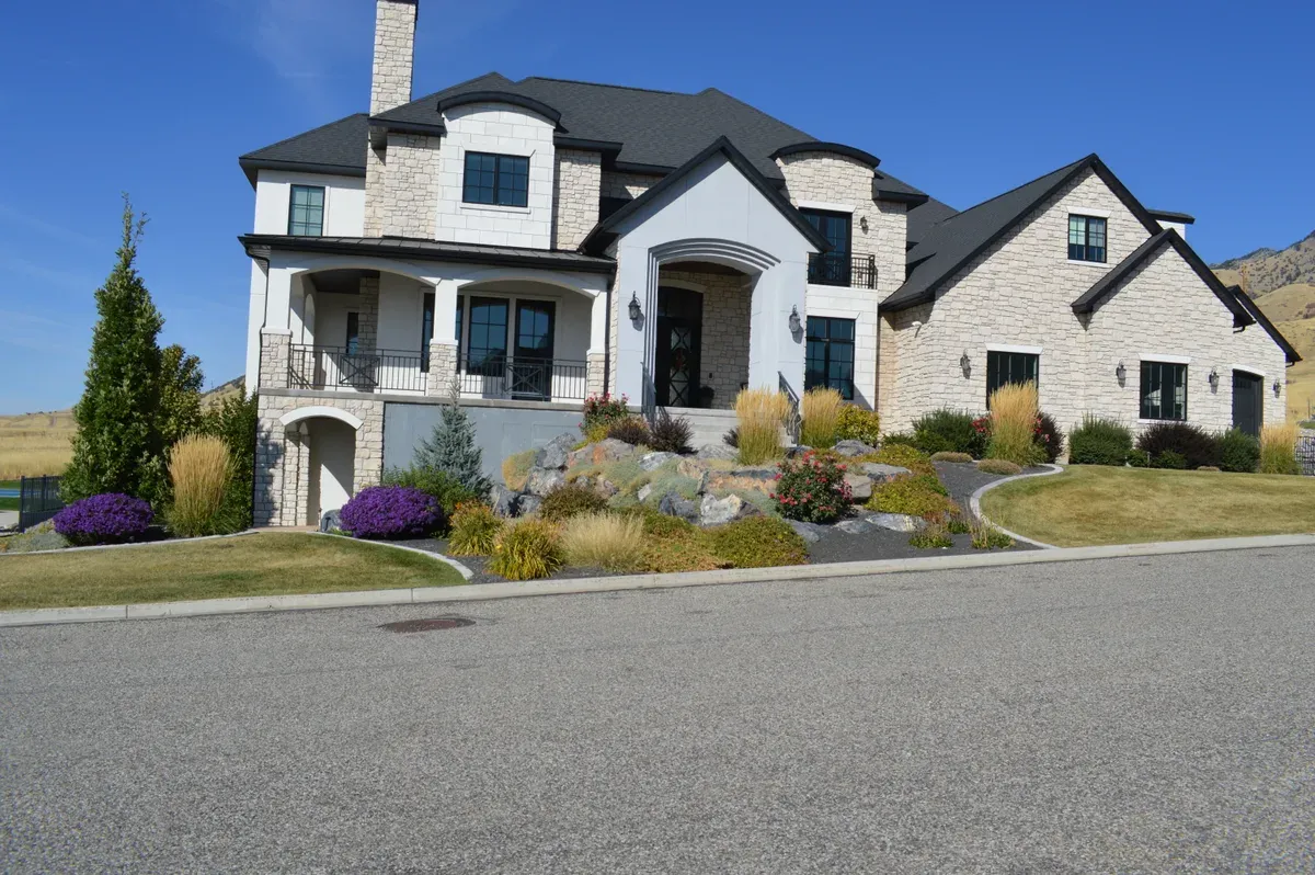 Sloped yard retaining wall in northern Utah